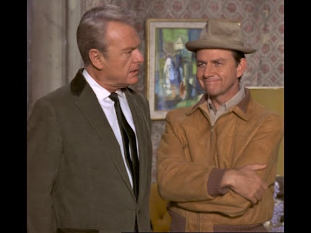 Green Acres TV show still featuring Oliver Douglas and Mr. Kimball